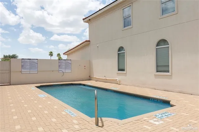 a view of a backyard of the house