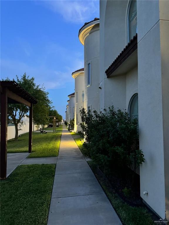1412 Keeton Avenue, Unit 28 McAllen, TX 78503 - Photo 2 of 15 a view of a house with backyard and garden