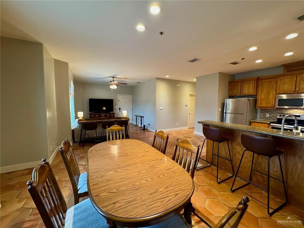1412 Keeton Avenue, Unit 28 McAllen, TX 78503 - Photo 4 of 15 a view of a dining room with furniture