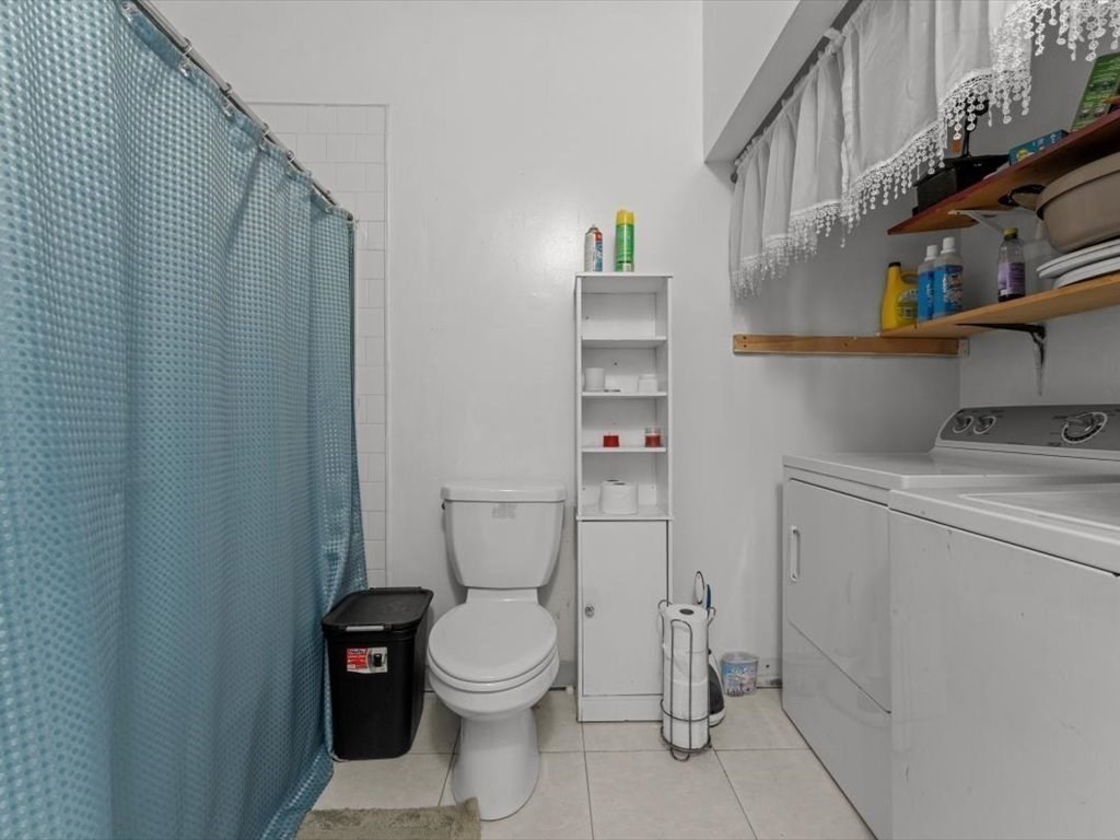 120 Grand Street Worcester, MA 01603 - Photo 19 of 36 a bathroom with a toilet and a sink