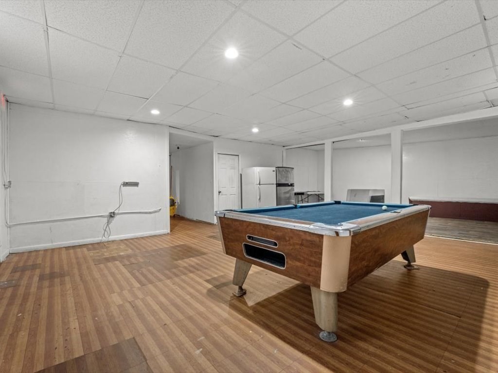 120 Grand Street Worcester, MA 01603 - Photo 28 of 36 a room with wooden floor and pool table