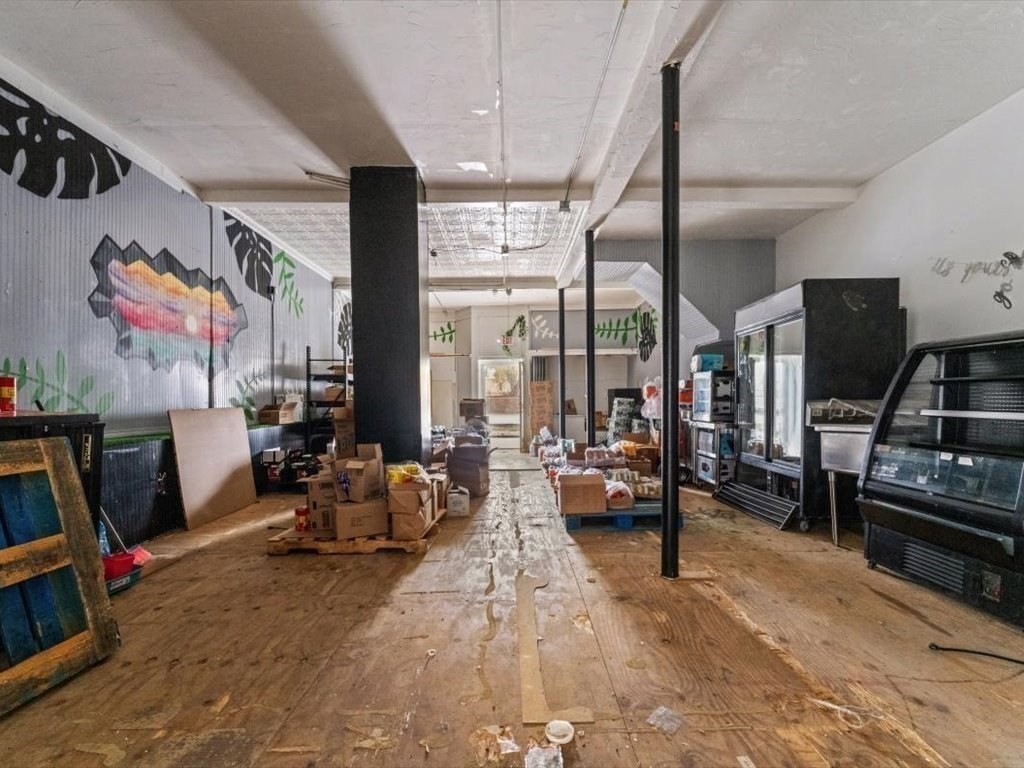 120 Grand Street Worcester, MA 01603 - Photo 30 of 36 a living room with furniture and a flat screen tv