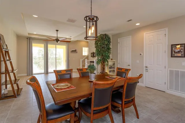 a view of a dining room with furniture window and outside view
