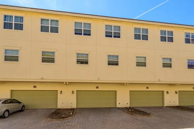 a view of a house with a garage