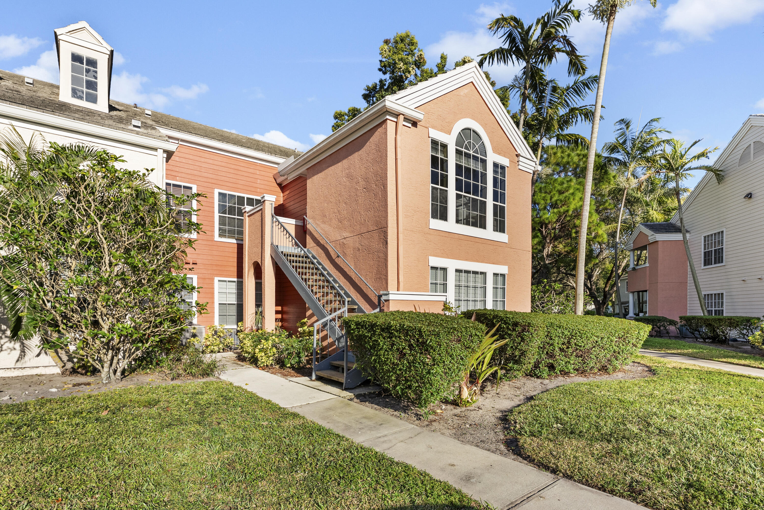 1365 Crystal Way, Unit H Delray Beach, FL 33444 - Photo 22 of 34 a view of a house with a yard