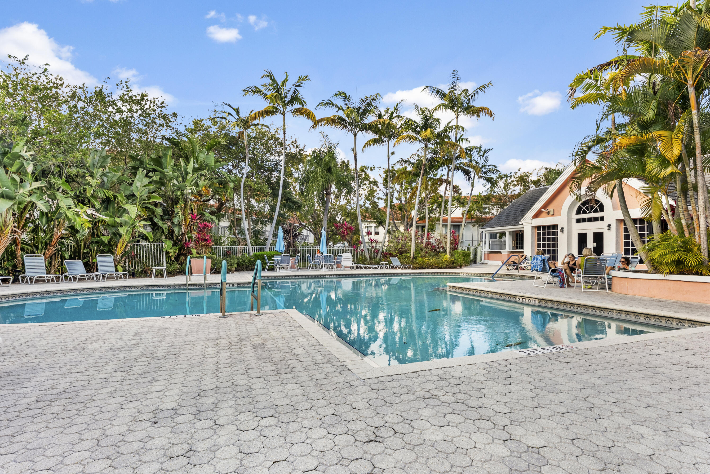 1365 Crystal Way, Unit H Delray Beach, FL 33444 - Photo 27 of 34 a view of a house with a yard