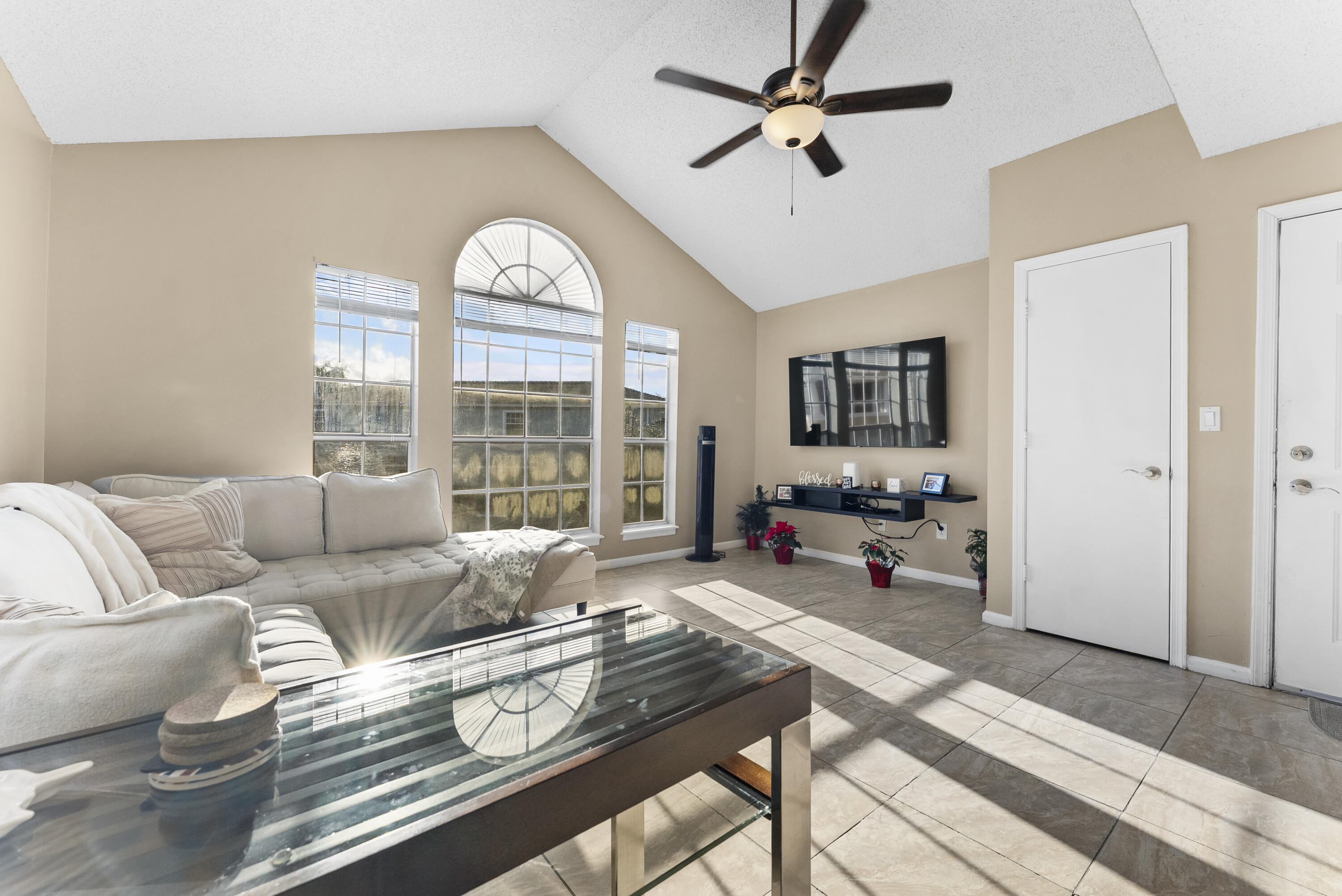 1365 Crystal Way, Unit H Delray Beach, FL 33444 - Photo 4 of 34 a living room with furniture and wooden floor