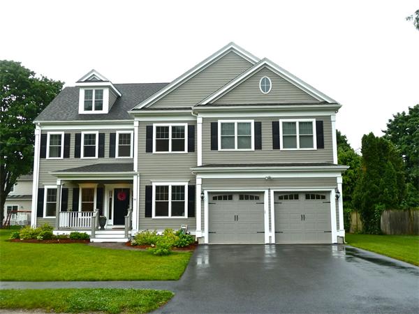 80 Richard Road Needham, MA 02492 - Photo 1 of 30 a front view of a house with garden
