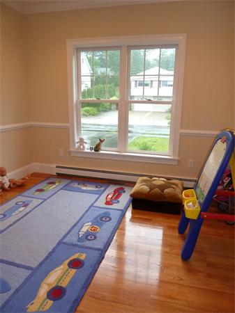 80 Richard Road Needham, MA 02492 - Photo 12 of 30 a bedroom with furniture and a window