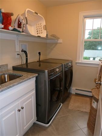 80 Richard Road Needham, MA 02492 - Photo 25 of 30 a utility room with sink dryer and washer