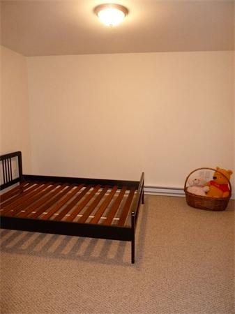 80 Richard Road Needham, MA 02492 - Photo 28 of 30 a view of a room with rack on the wall