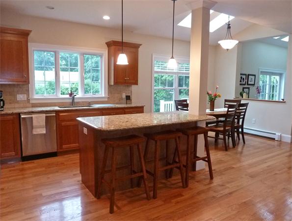 80 Richard Road Needham, MA 02492 - Photo 8 of 30 a dining table with chairs and wooden floor