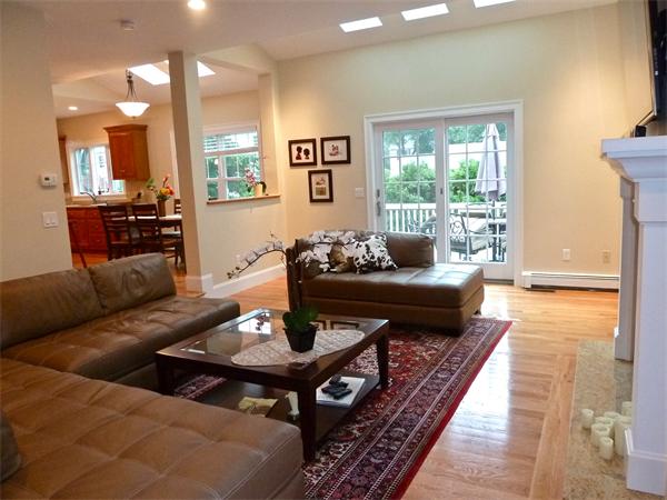 80 Richard Road Needham, MA 02492 - Photo 9 of 30 a living room with furniture and a table