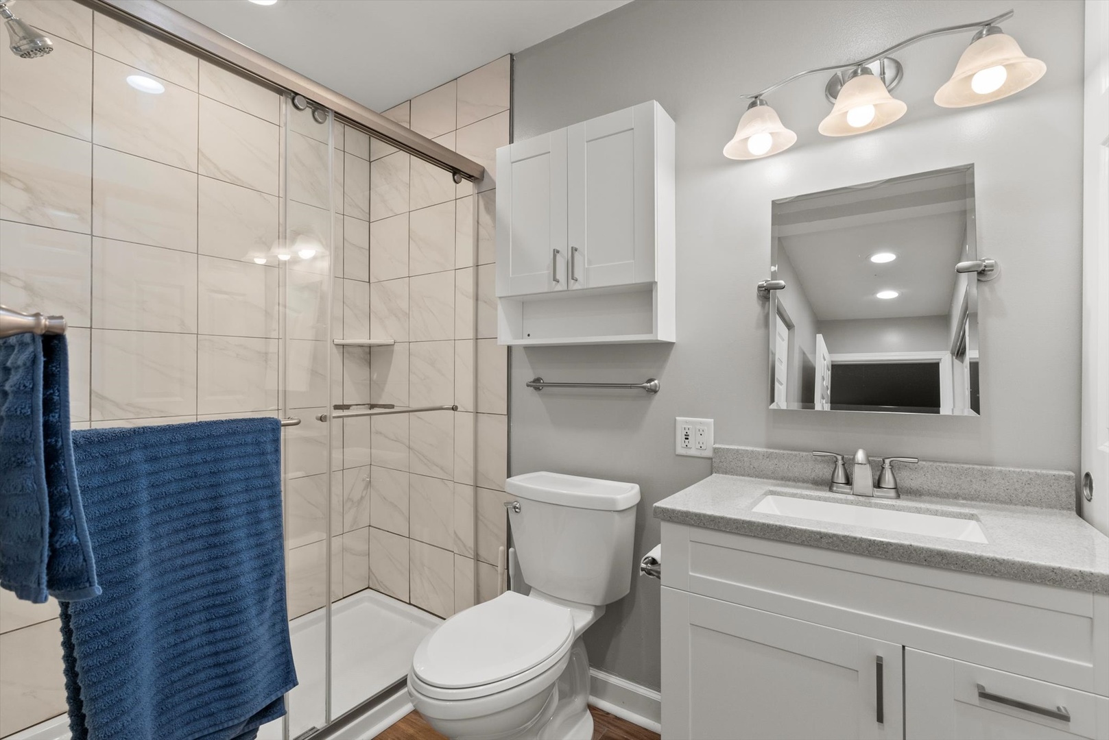 1426 Stonebridge Circle, Unit K8 Wheaton, IL 60189 - Photo 12 of 20 a bathroom with a sink a toilet and shower
