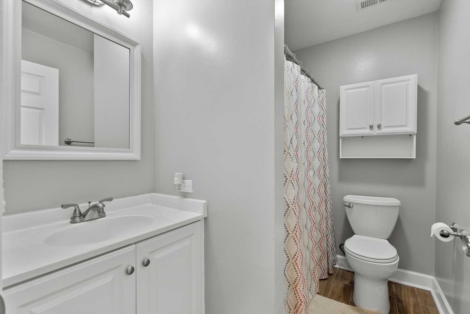 1426 Stonebridge Circle, Unit K8 Wheaton, IL 60189 - Photo 16 of 20 a bathroom with a sink toilet and vanity