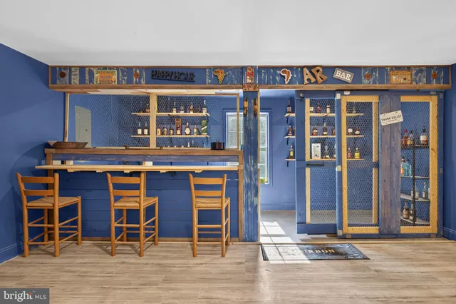 a view of a hallway with shelves