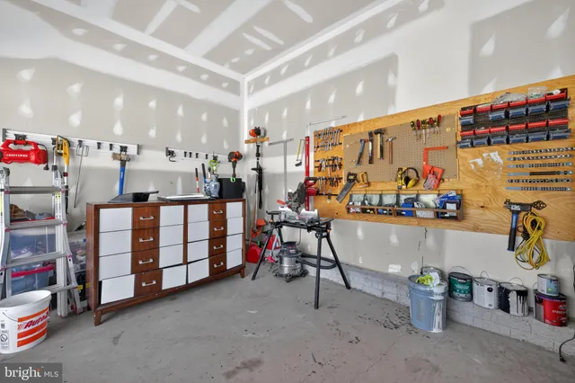 a room with gym equipment and a large window