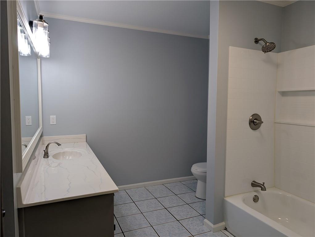 402 Pheasant Run Rome, GA 30161 - Photo 53 of 74 a bathroom with a sink a toilet and shower