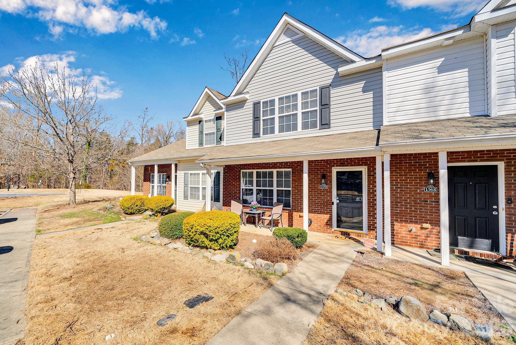 1570 Maypine Commons Way Rock Hill, SC 29732 - Photo 22 of 23 a front view of a house with a patio
