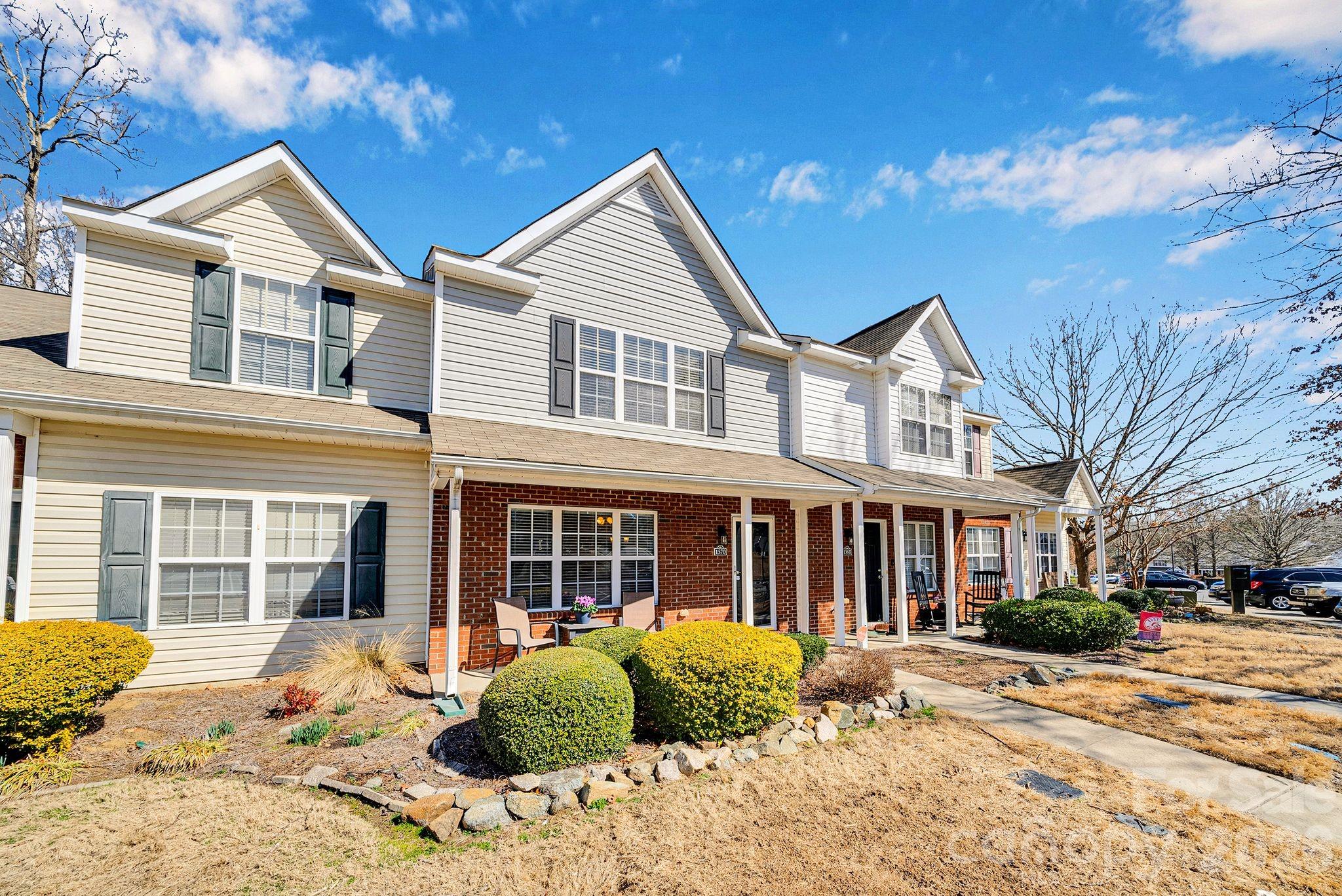 1570 Maypine Commons Way Rock Hill, SC 29732 - Photo 23 of 23 a front view of a house with a yard
