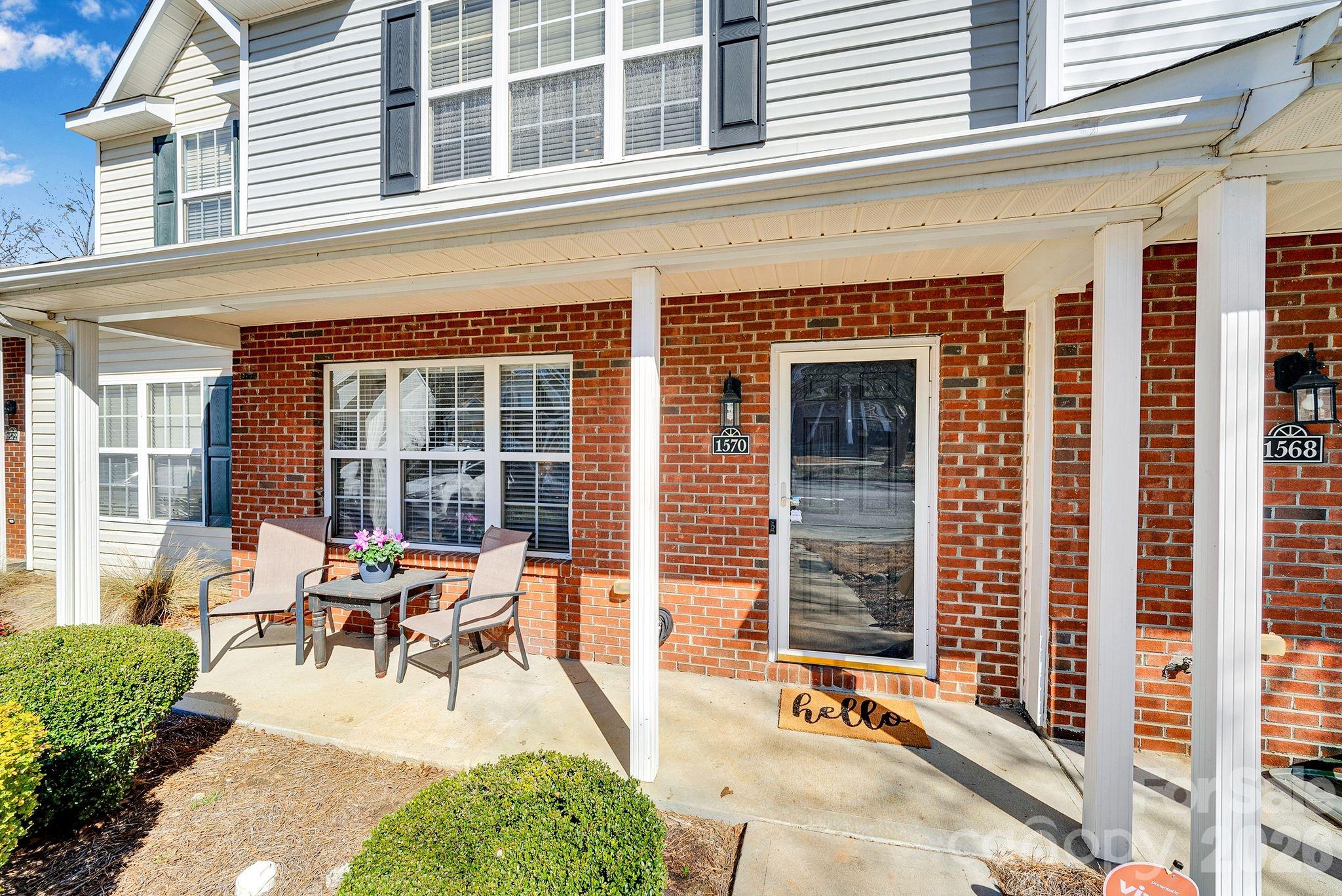 1570 Maypine Commons Way Rock Hill, SC 29732 - Photo 3 of 23 front view of a building with a patio