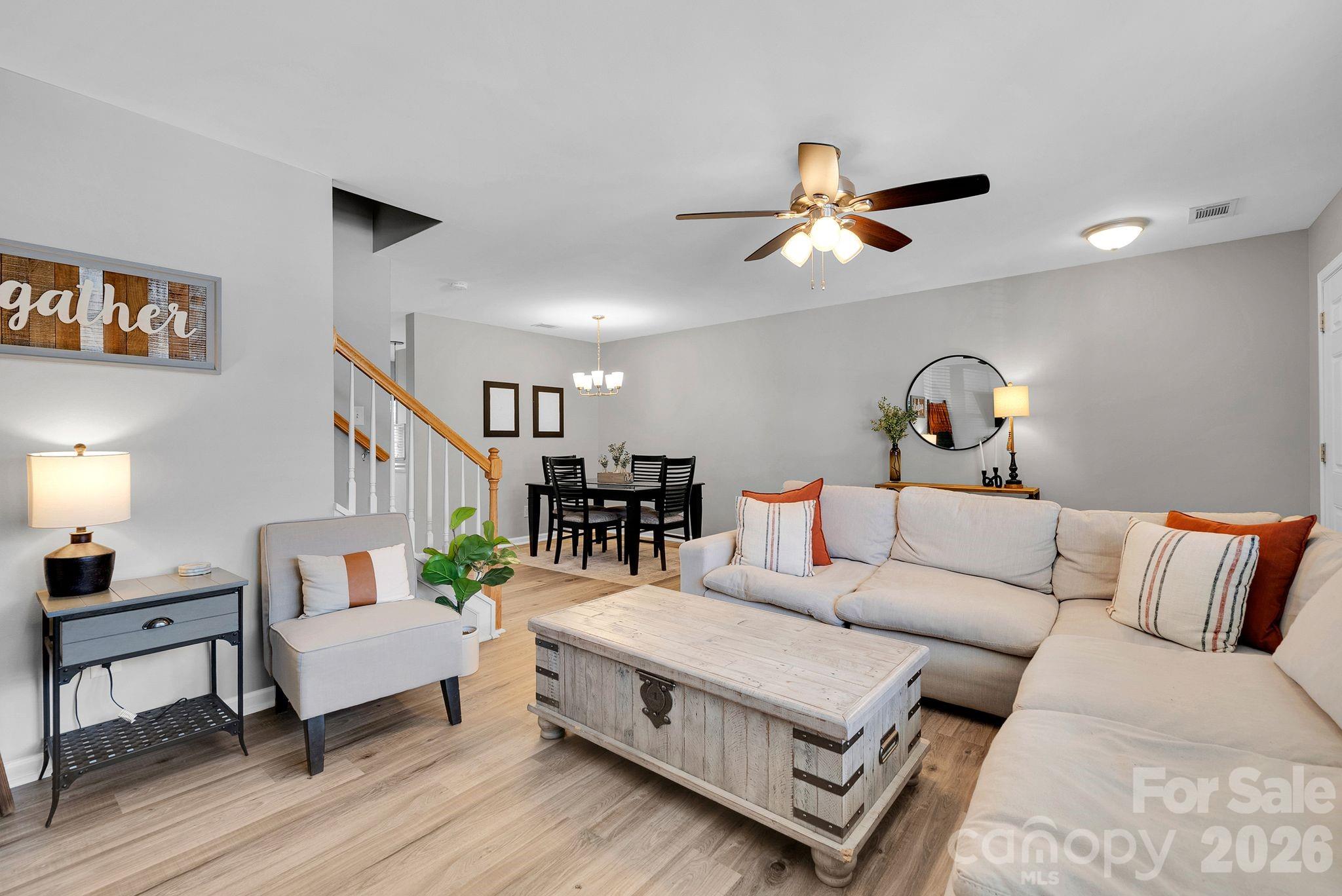 1570 Maypine Commons Way Rock Hill, SC 29732 - Photo 4 of 23 a living room with furniture or couch and a ceiling fan