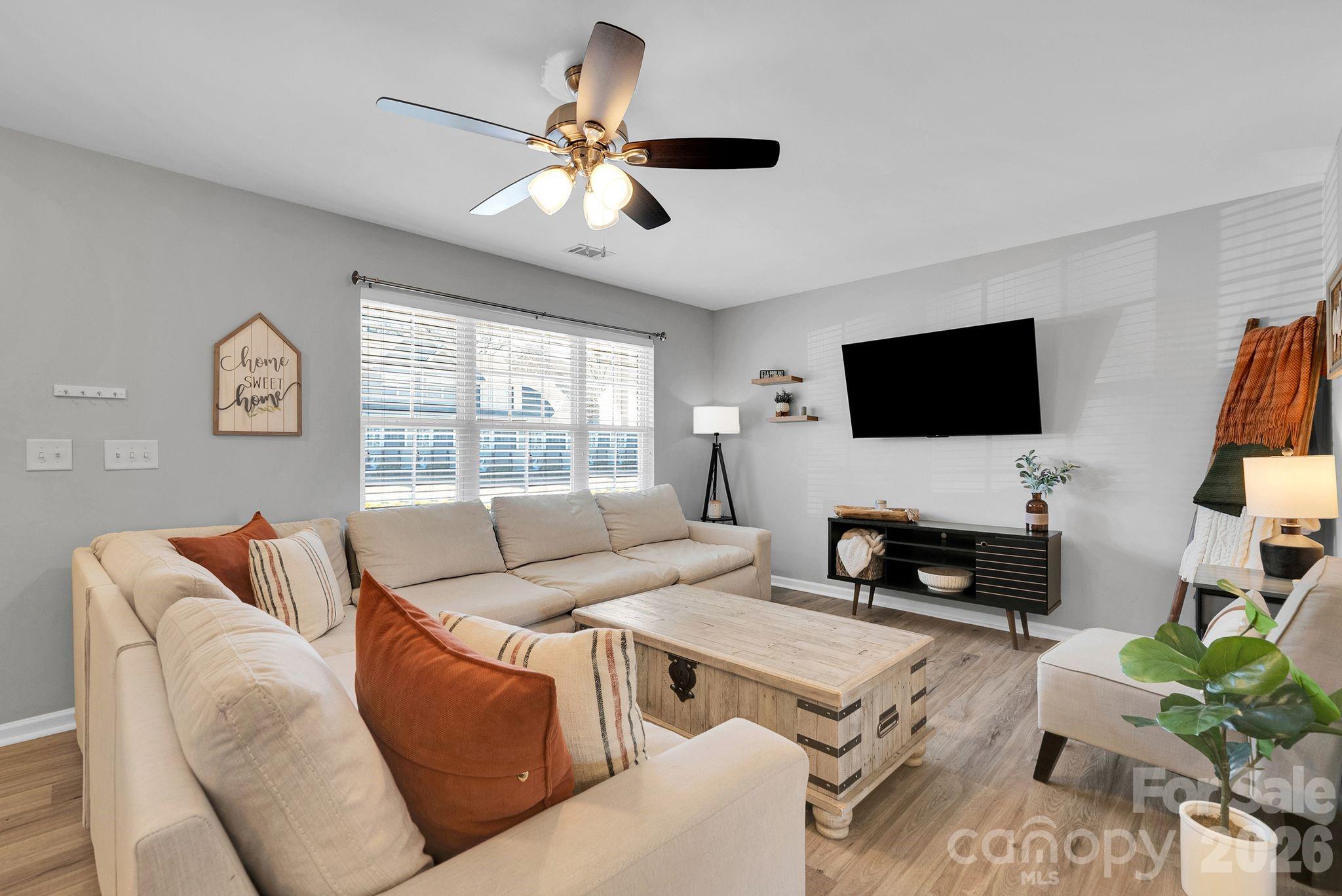 1570 Maypine Commons Way Rock Hill, SC 29732 - Photo 6 of 23 a living room with furniture and a flat screen tv