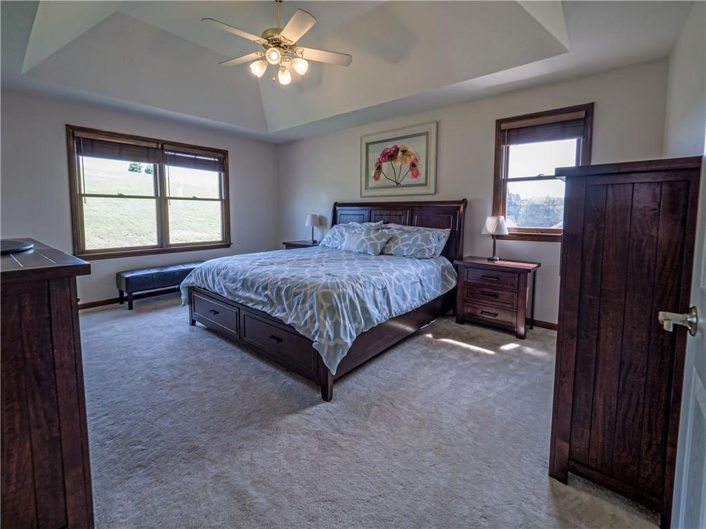 7003 Eagle Road Gibsonia, PA 15044 - Photo 13 of 25 The owner's suite is bright and features neutral decor and trey ceiling.
