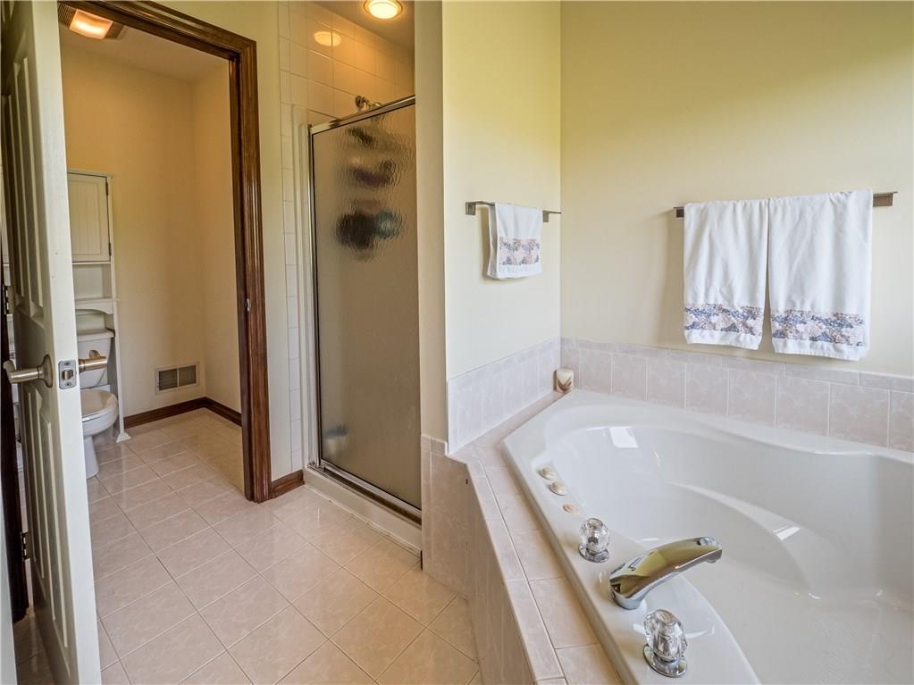 7003 Eagle Road Gibsonia, PA 15044 - Photo 16 of 25 The owner's bath also features a private bathroom.