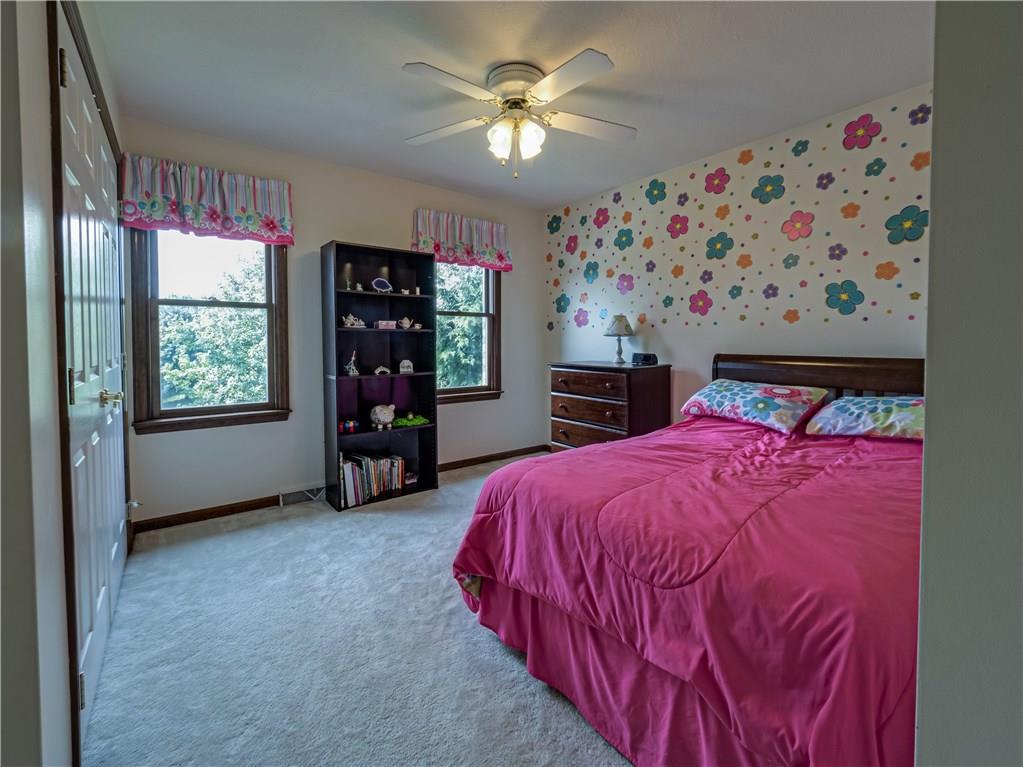 7003 Eagle Road Gibsonia, PA 15044 - Photo 19 of 25 A second guest bedroom is filled with natural sunlight and features ample closet space.