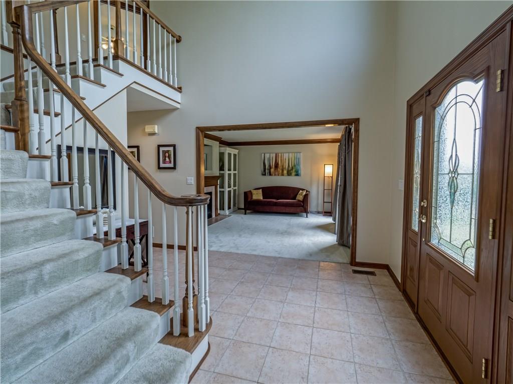 7003 Eagle Road Gibsonia, PA 15044 - Photo 3 of 25 Enter the open and bright two story foyer flanked by the dining room and formal living room.