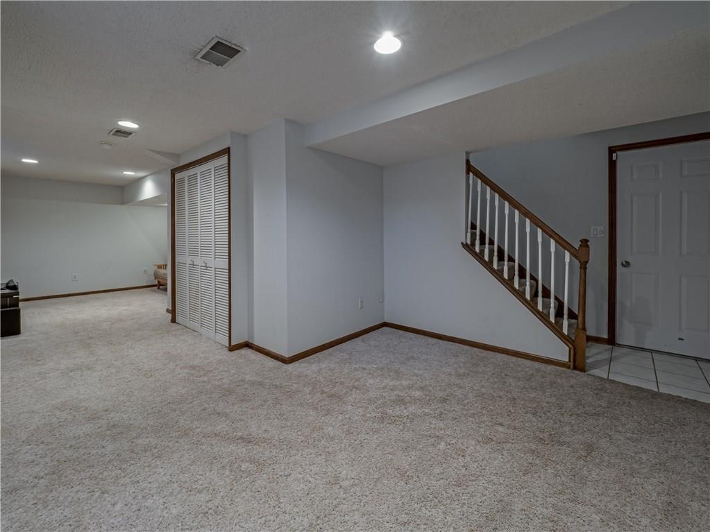 7003 Eagle Road Gibsonia, PA 15044 - Photo 21 of 25 The finished lower level is bright and spacious.