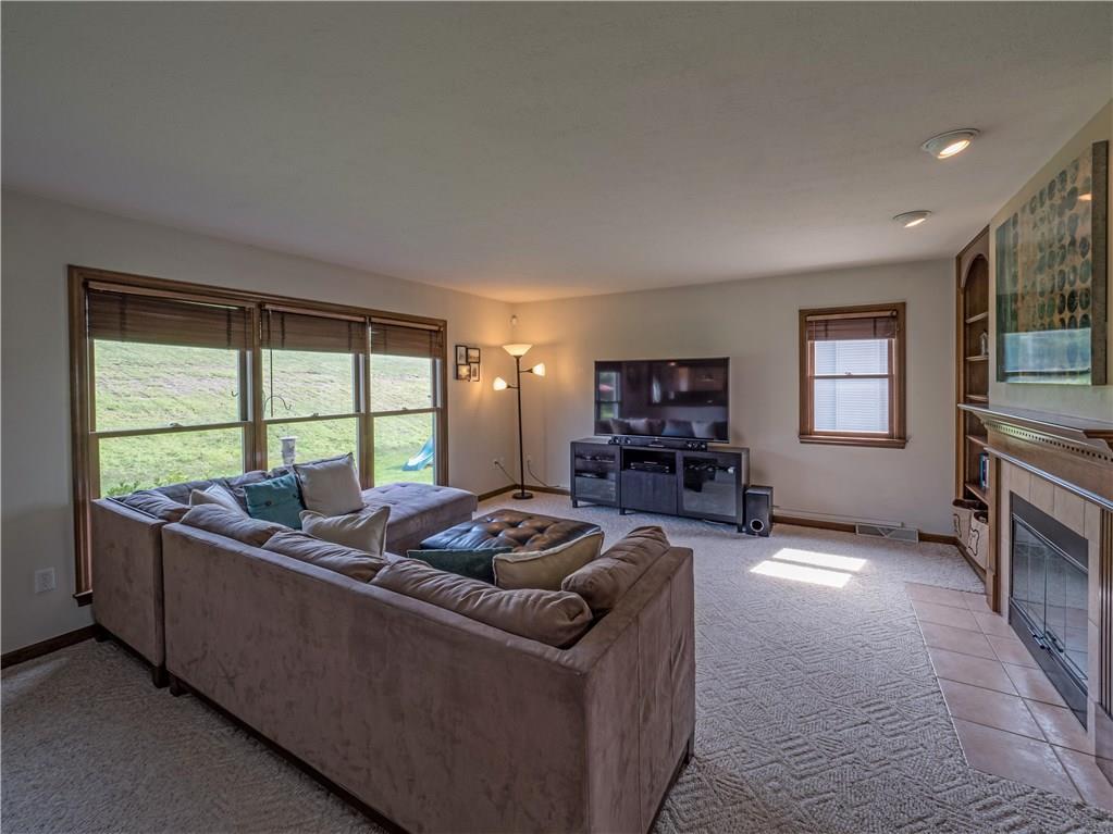 7003 Eagle Road Gibsonia, PA 15044 - Photo 10 of 25 The spacious family room features neutral decor and multiple bright windows.
