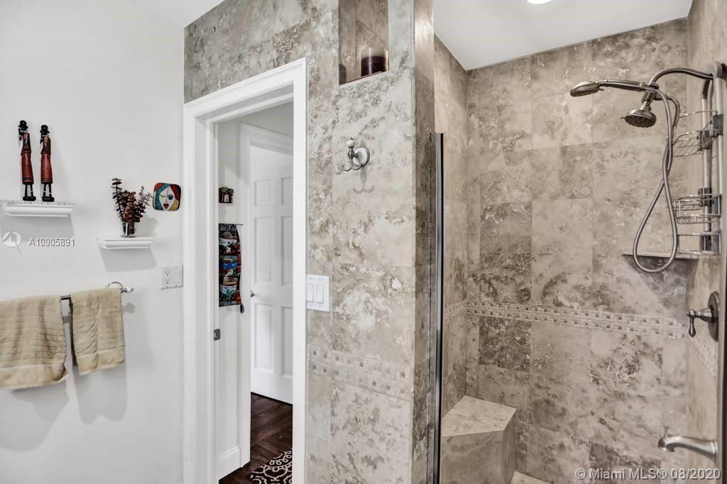1301 South Biscayne Point Road Miami Beach, FL 33141 - Photo 19 of 45 a bathroom with a shower