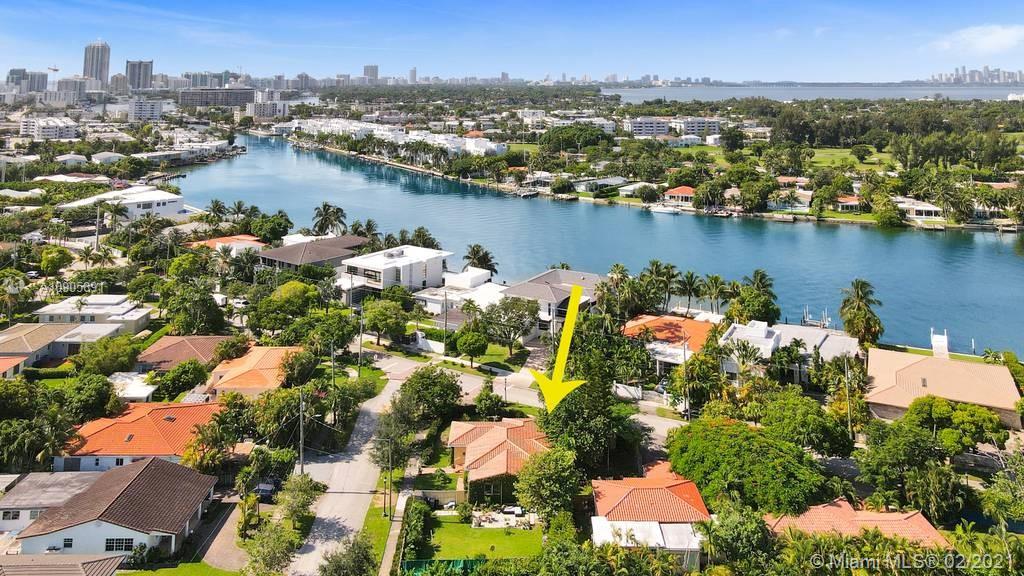 1301 South Biscayne Point Road Miami Beach, FL 33141 - Photo 27 of 45 an aerial view of lake and residential houses with outdoor space and swimming pool