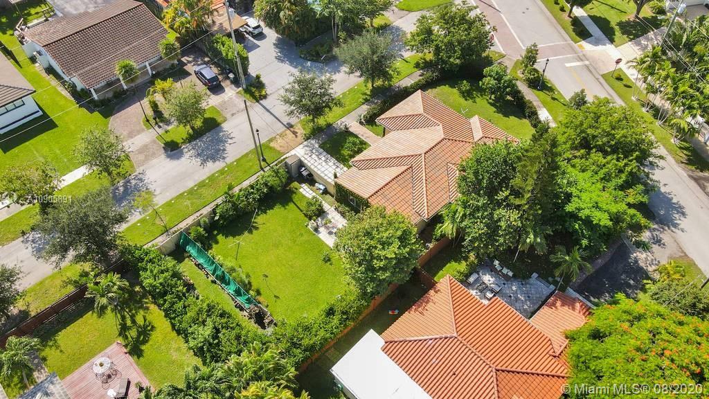 1301 South Biscayne Point Road Miami Beach, FL 33141 - Photo 31 of 45 an aerial view of residential house with yard and swimming pool