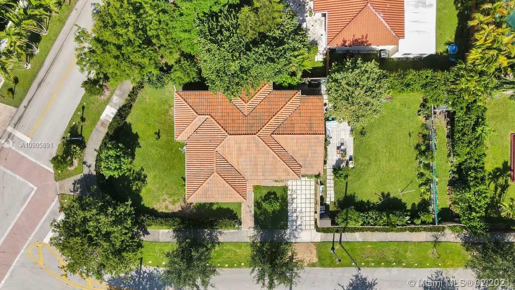 1301 South Biscayne Point Road Miami Beach, FL 33141 - Photo 37 of 45 an aerial view of a house with a yard and potted plants