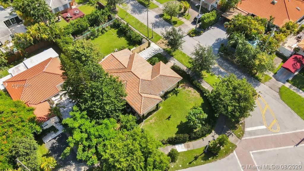 1301 South Biscayne Point Road Miami Beach, FL 33141 - Photo 39 of 45 an aerial view of a house with a yard and garden