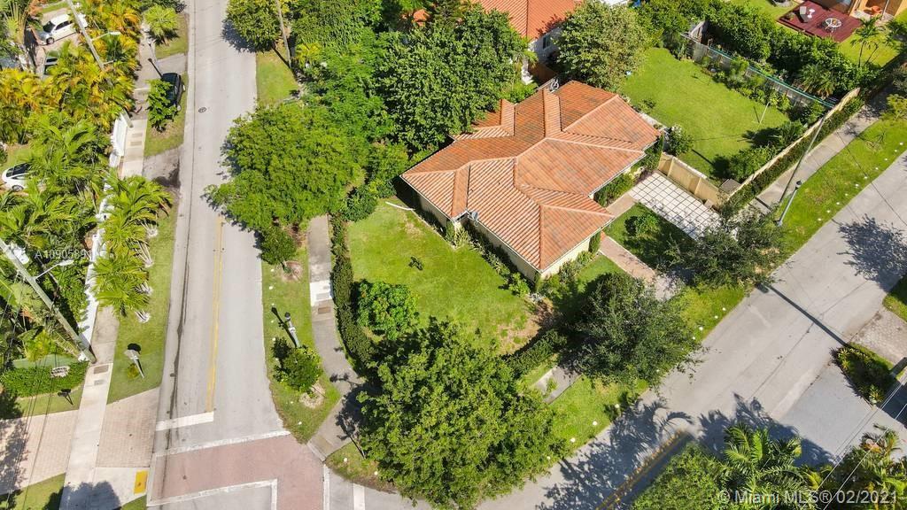 1301 South Biscayne Point Road Miami Beach, FL 33141 - Photo 40 of 45 an aerial view of a house with swimming pool and garden