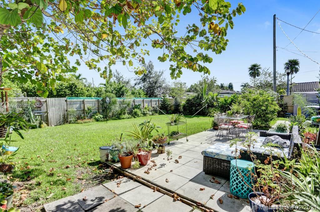1301 South Biscayne Point Road Miami Beach, FL 33141 - Photo 45 of 45 a view of a backyard with sitting area