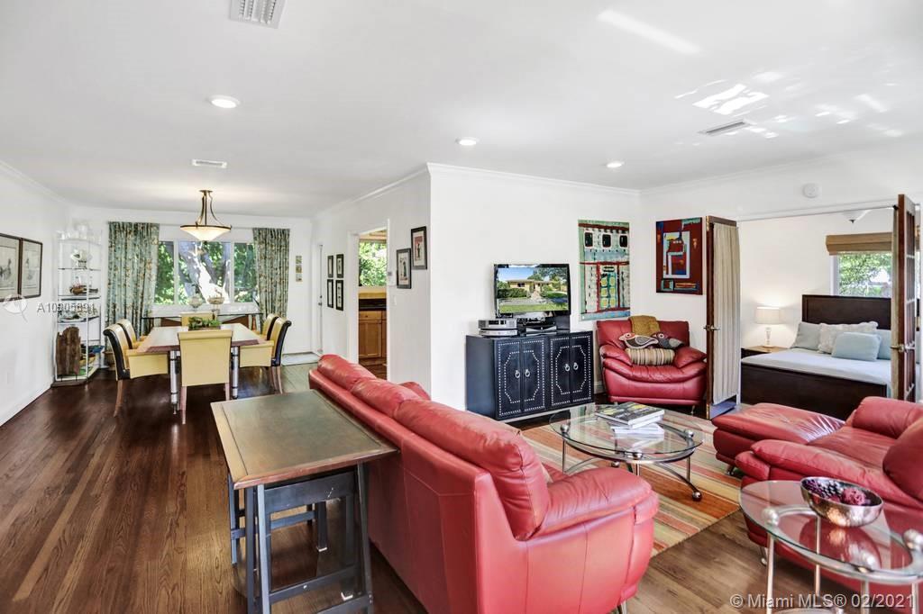 1301 South Biscayne Point Road Miami Beach, FL 33141 - Photo 8 of 45 a living room with furniture a rug and a table