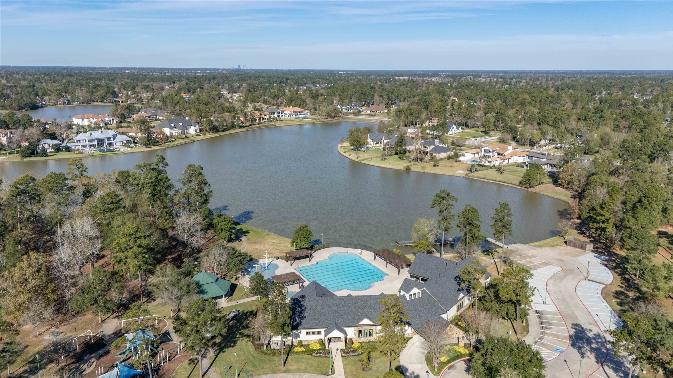27430 Whispering Maple Way Spring, TX 77386 - Photo 6 of 12 an aerial view of lake and residential houses with outdoor space