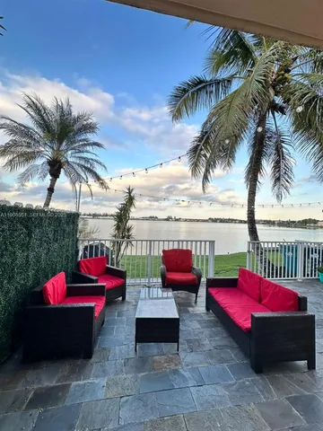 a view of balcony with a patio