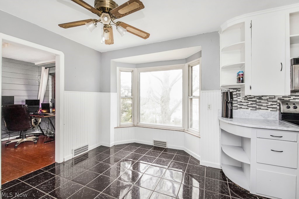 740 West Schaaf Road Cleveland, OH 44109 - Photo 11 of 25 Large window and eat in area overlooking backyard