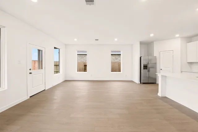 an empty room with windows