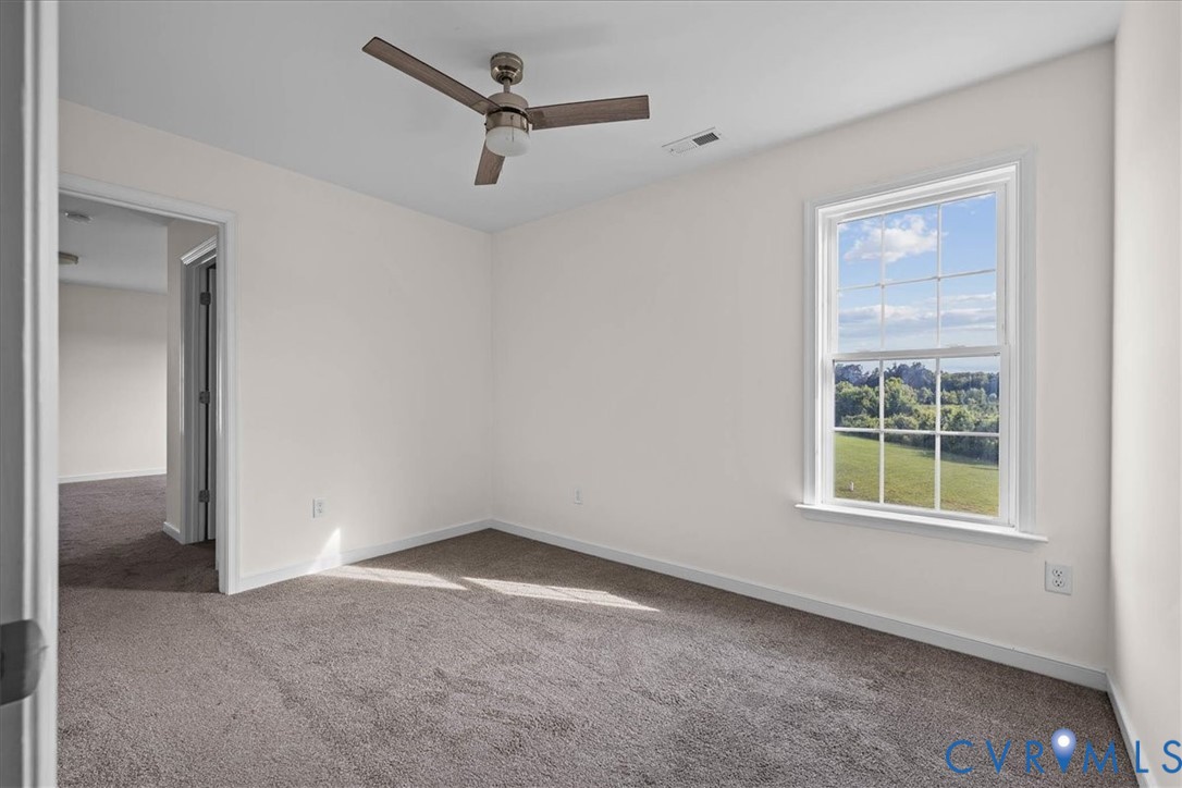 11325 Webb Road Disputanta, VA 23842 - Photo 24 of 32 an empty room with a window