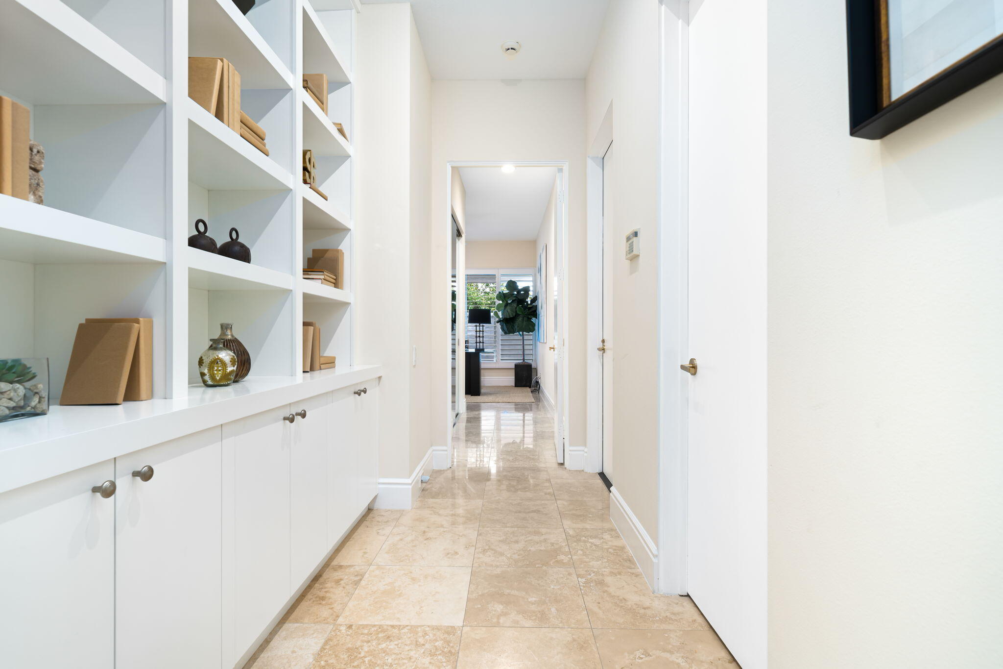 50 Fincher Way Rancho Mirage, CA 92270 - Photo 54 of 63 Hallway with built-in bookcases