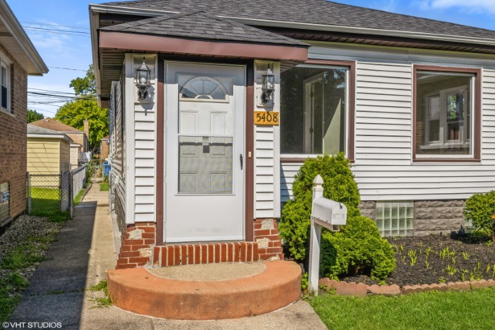 a view of a house with a small porch