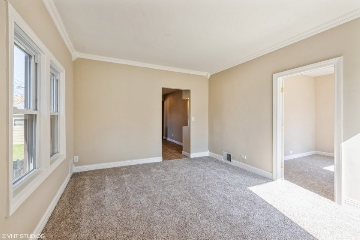 5408 South Rutherford Avenue Chicago, IL 60638 - Photo 3 of 15 a view of an empty room with window