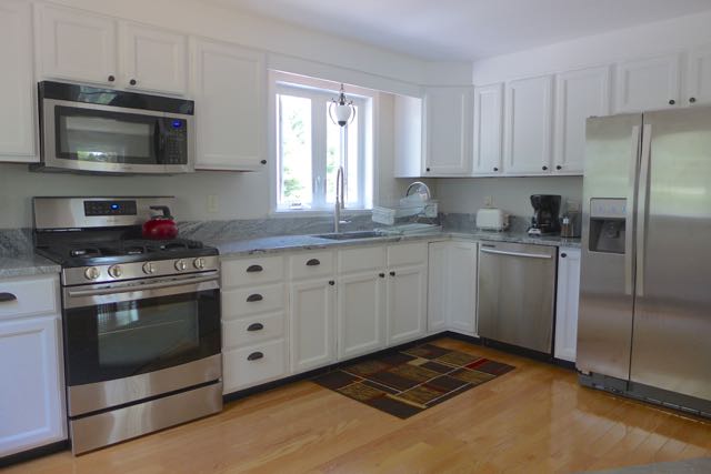 75 Dodgers Hole Road Edgartown, MA 02539 - Photo 2 of 18 Kitchen JUST updated with all new appliances, new granite counter tops and fresh paint - perfect!